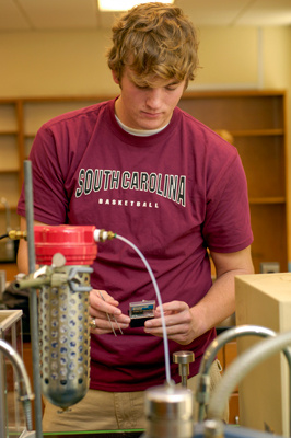 Nick Riley working in lab as a student.