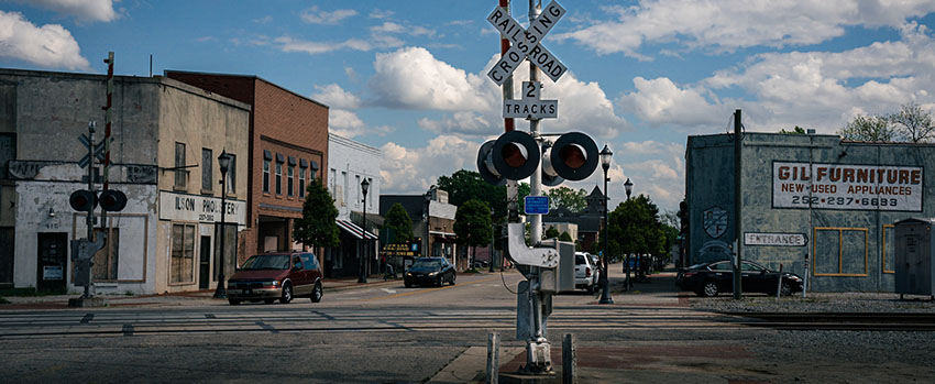 Small town with railroad tracks and signal