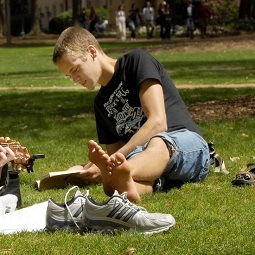 Student reading in the park