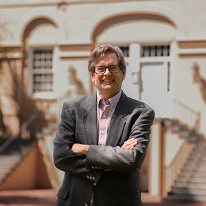 Scott Smith smiles on the Horseshoe while crossing his arms