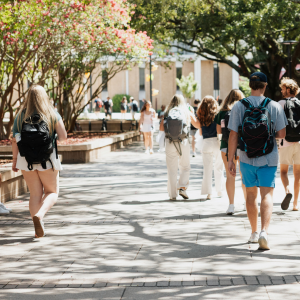 Students walking near Thomas Cooper Library