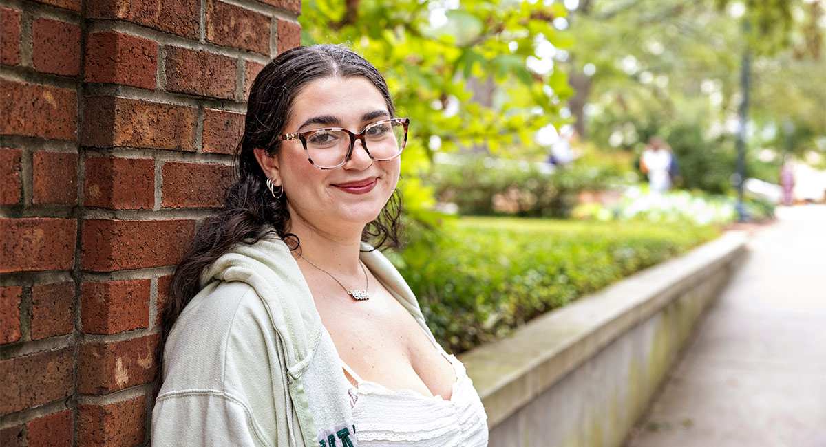 Jillian Bourbeau is photographed standing outdoors on USC campus