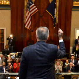 Harris Pastides in front of assembly